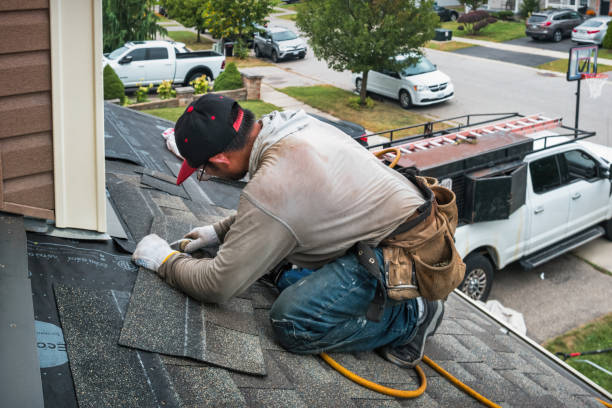 Professional Roofing technician working in King William, VA